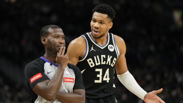 Milwaukee Bucks forward Giannis Antetokounmpo (34) argues with referee James Williams (60) 